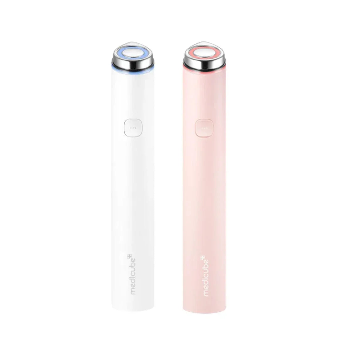 White and pink Medicube facial cleansing brushes for glowing skin care routine